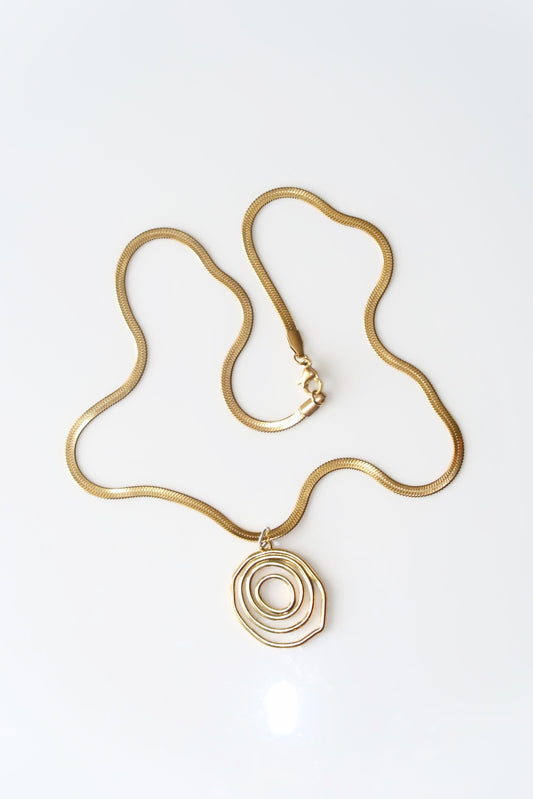 ZINNIA - GOLD SWIRL NECKLACE IN STAINLESS STEEL WITH 18K GOLD PLATING WATERPROOF